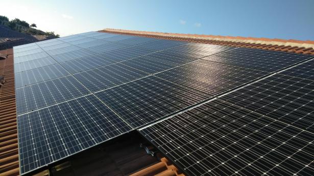 Image of solar panels on rooftop of home.