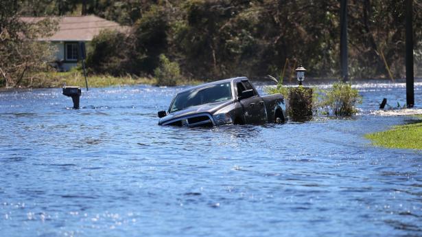 Hurrican Ian flooded truck