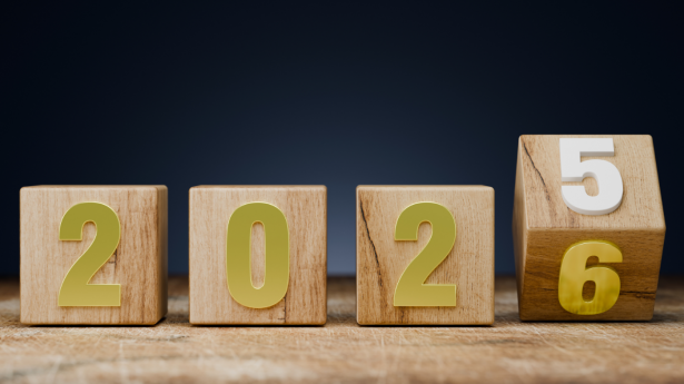 wood blocks each with a number from 2025 on them with the last block changing to a 6