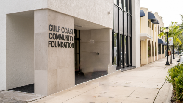 outside of a building that says Gulf Coast Community Foundation