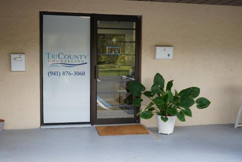 Doors to office, plant, mailbox