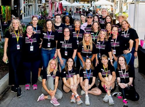 Gulf Coast Community Foundation group picture outdoors at Better Together event on State St.