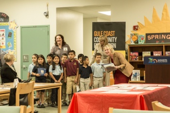 Elementary School Classroom with Students and Teachers