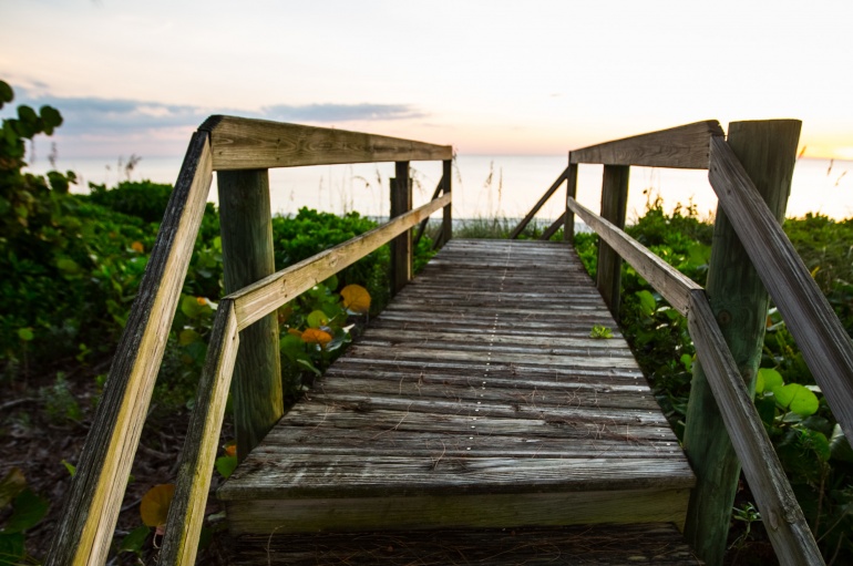 Wooden bridge to a coastal beach