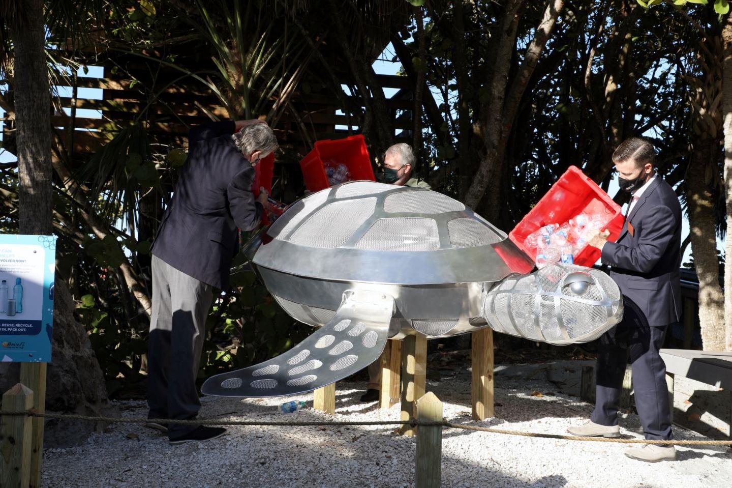 Metal turtle being filled with plastic bottles