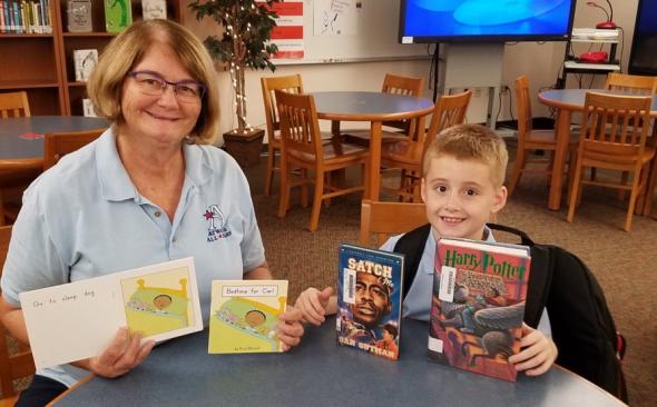 Reading Recovery teacher Julie Sardo and Colton